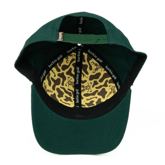 Green cap with camouflage pattern on the interior, featuring 'barkie golf' branding.