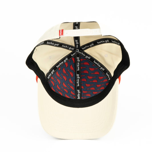 Baseball cap with red and black cardinal birdie pattern on a white background