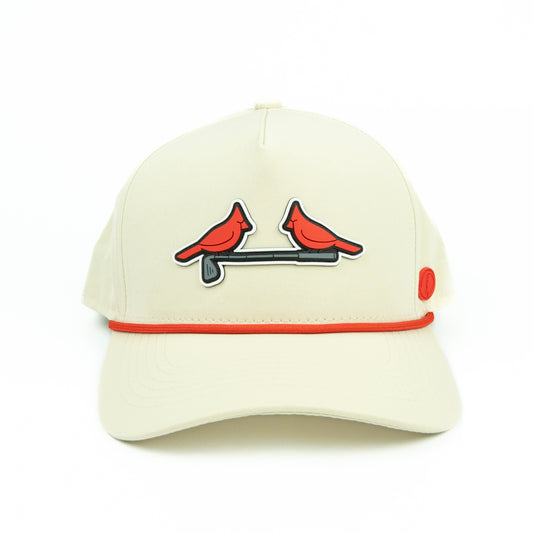 Beige cap with red accents and cardinal bird design on a white background