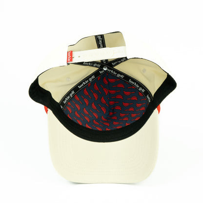 Beige hat with cardinal bird pattern inside