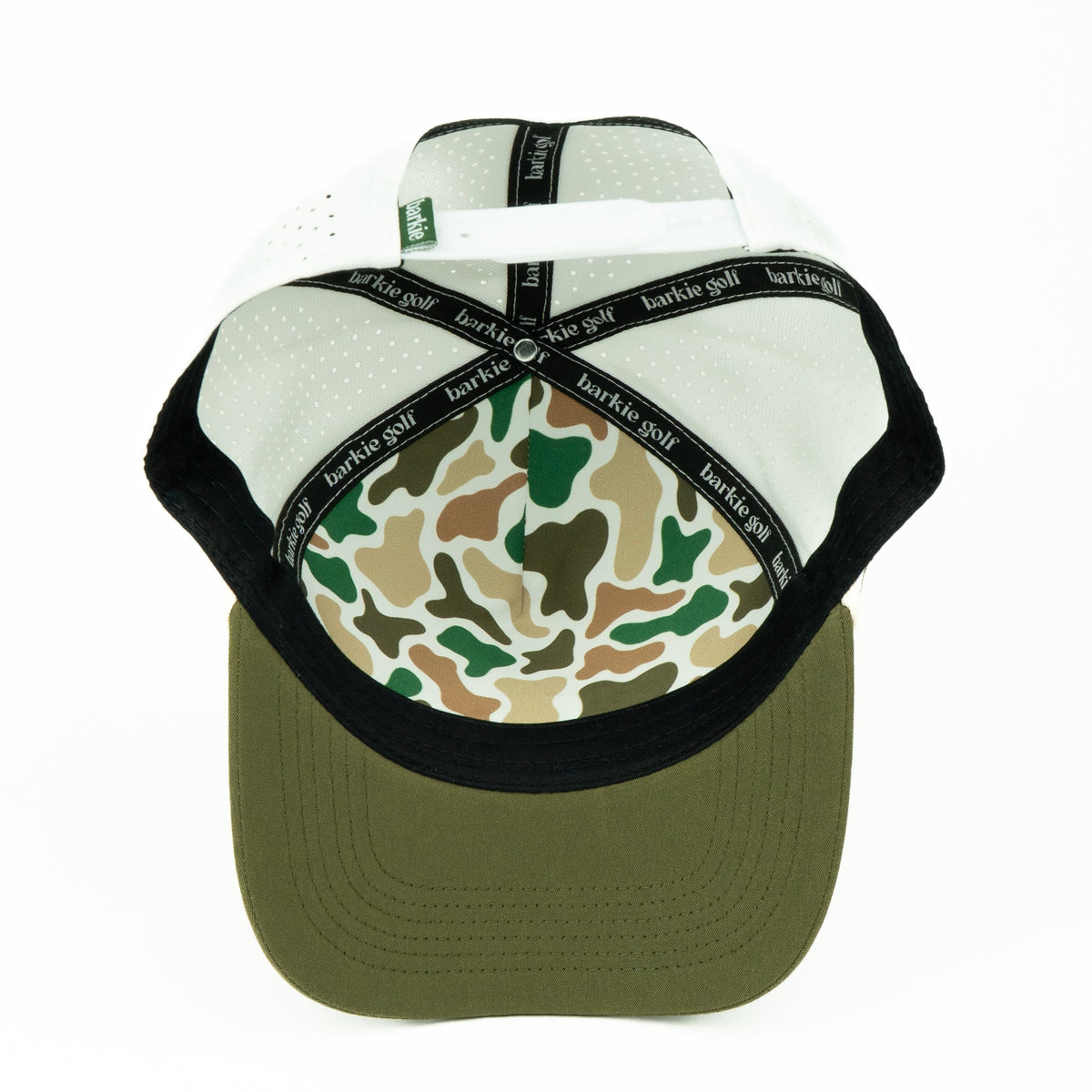 white and olive cap with camouflage inner pattern on a white background